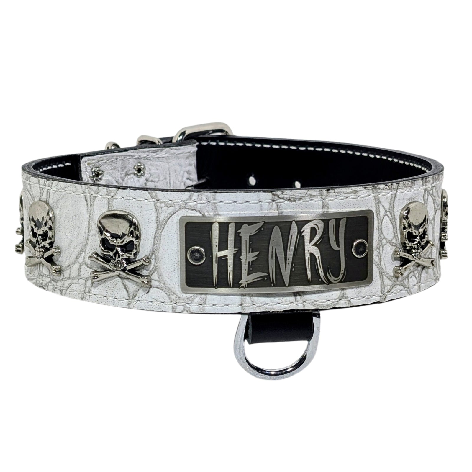 Dog collar with skull design and nameplate 'HENRY' on a white background