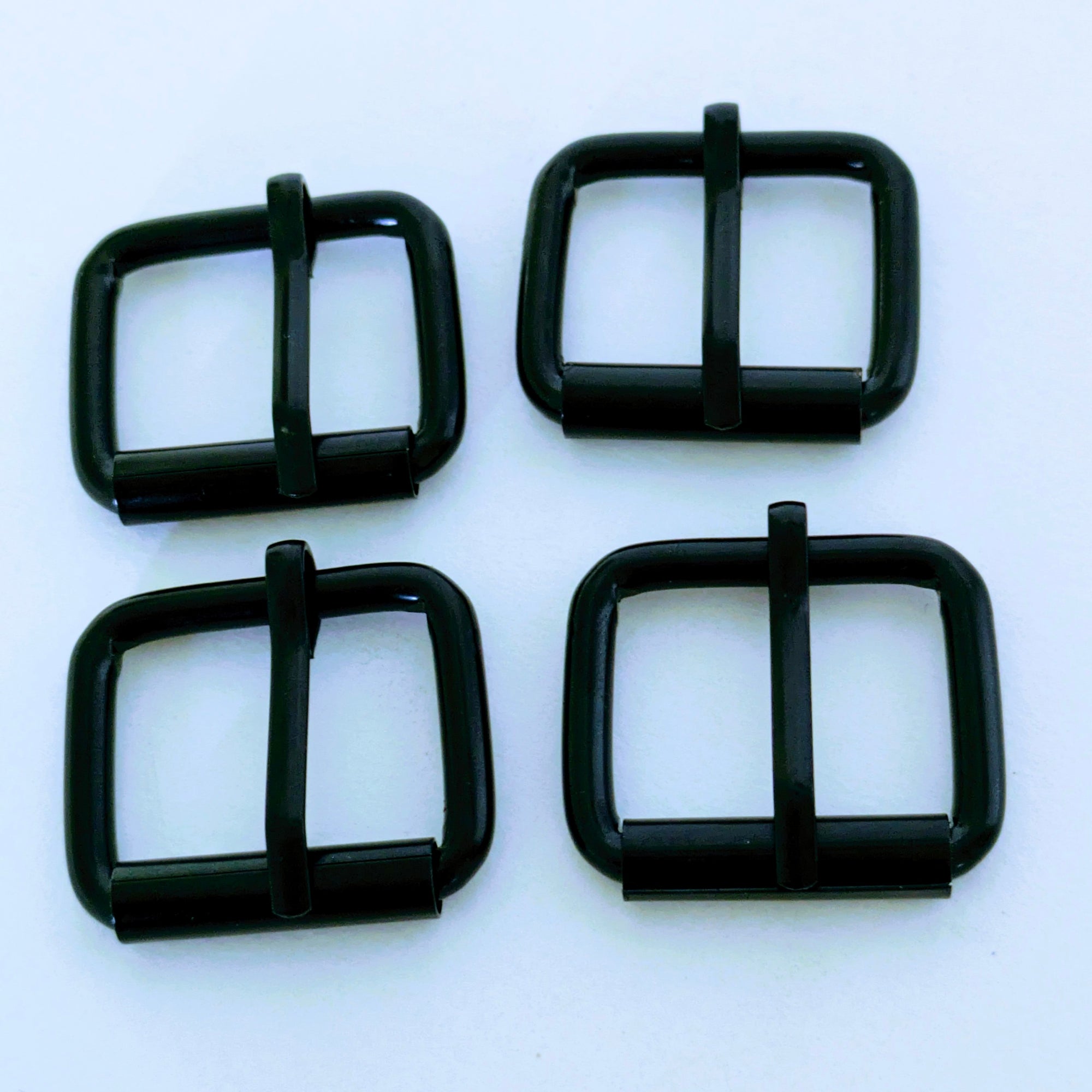 Hebillas de rodillo de una sola punta negras de 1" (paquete de 4)