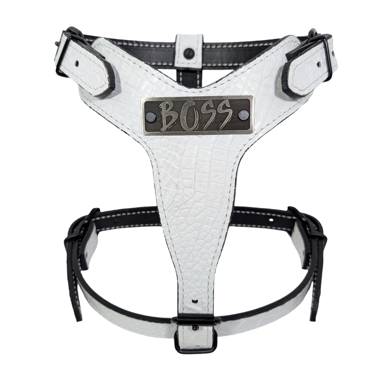 White dog harness with 'BOSS' label on a white background