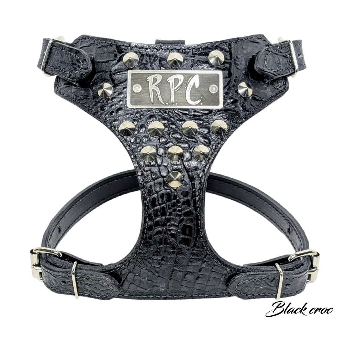Black crocodile-patterned dog harness with &#39;RPC&#39; branding on a white background
